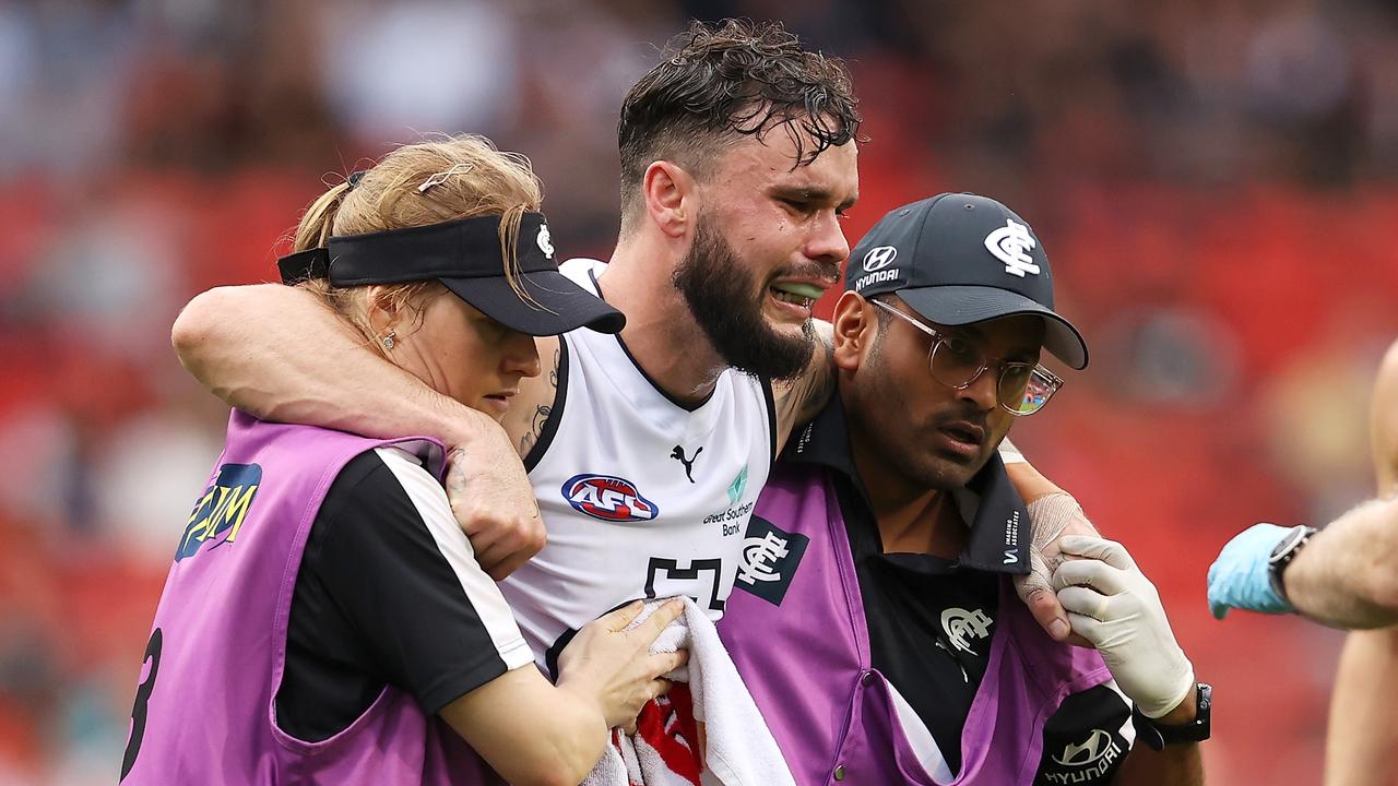 Zac Williams is helped from the field after being injured in 2022. Picture: Mark Kolbe/Getty Images