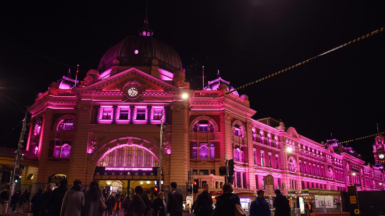 Melbourne’s Flinders Street Station lights up in Pink in tribute of Olivia Newton-John. Picture: Josie Hayden