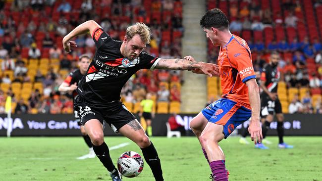 Melbourne City’s Nathaniel Atkinson (left) is challenged by Brisbane Roar’s Louis Zabala at Suncorp Stadium last month. Picture: Bradley Kanaris/Getty Images