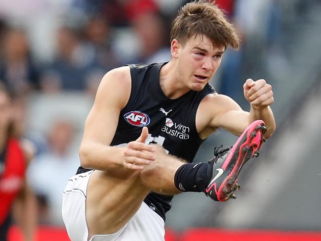 MELBOURNE, AUSTRALIA - MAY 02: Paddy Dow of the Blues kicks the ball during the 2021 AFL Round 07 match between the Essendon Bombers and the Carlton Blues at the Melbourne Cricket Ground on May 02, 2021 in Melbourne, Australia. (Photo by Michael Willson/AFL Photos via Getty Images)