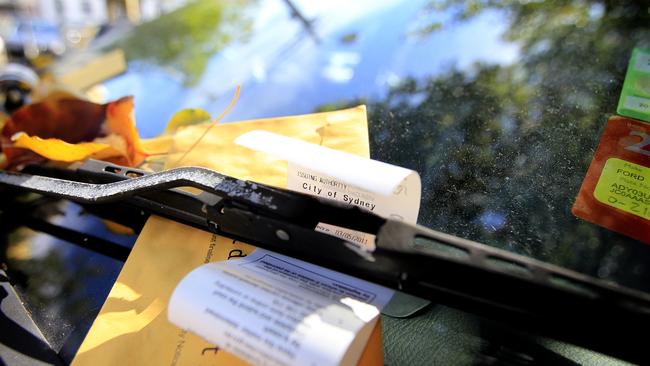 Generic photographs of parking tickets, City of Sydney. Ranger, fine, car