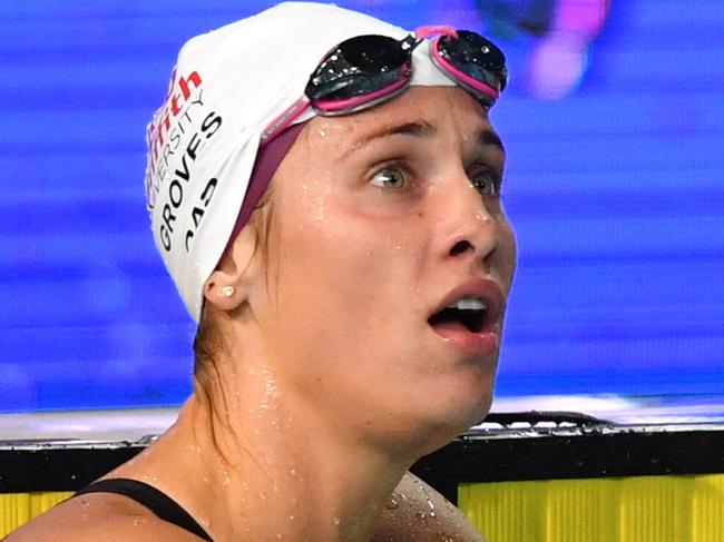 Laura Taylor (right) celebrates winning the womens 200 metre Butterfly Final as Madeline Groves (left) reacts during day one of the 2018 Australian Swimming Trials at the Gold Coast Aquatic Centre at Southport on the Gold Coast, Wednesday, February 28, 2018. (AAP Image/Darren England) NO ARCHIVING, EDITORIAL USE ONLY