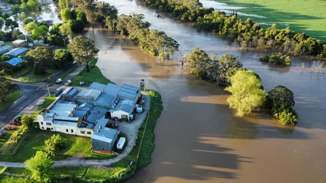 Flood waters crept close to businesses in Orbost before peaking at 7.71 metres. Picture: Tim Cotter