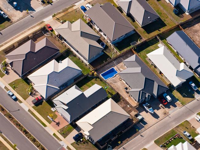 Aerial photograph of a suburban housing development in Townsville, Australia.