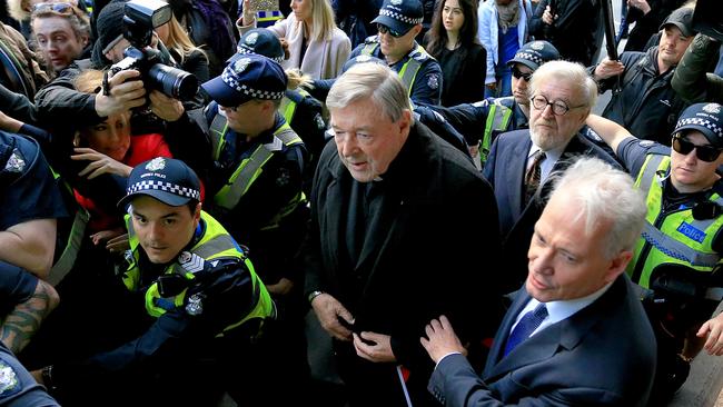 Cardinal George Pell arrives at the Melbourne Magistrates Court to face a filing hearing on historical sexual assault offences. Picture: Mark Stewart