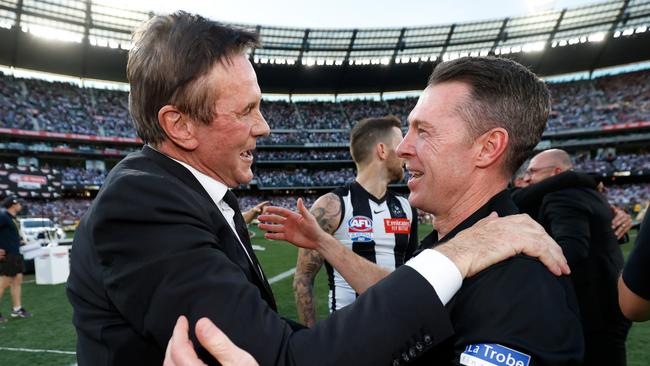 MELBOURNE, AUSTRALIA - SEPTEMBER 30: Collingwood President Jeff Browne and Craig McRae, Senior Coach of the Magpies celebrate during the 2023 AFL Grand Final match between the Collingwood Magpies and the Brisbane Lions at the Melbourne Cricket Ground on September 30, 2023 in Melbourne, Australia. (Photo by Dylan Burns/AFL Photos via Getty Images)