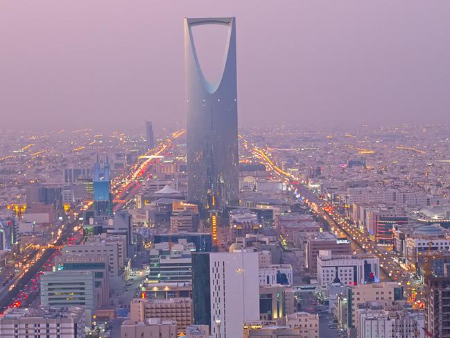 Riyadh, Saudi Arabia. the Kingdom tower is visible in the cityscape.