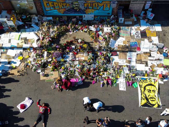 An aerial view shows people gathering to pay tribute at a makeshift memorial in honour of George Floyd in Minneapolis, Minnesota. Picture: AFP