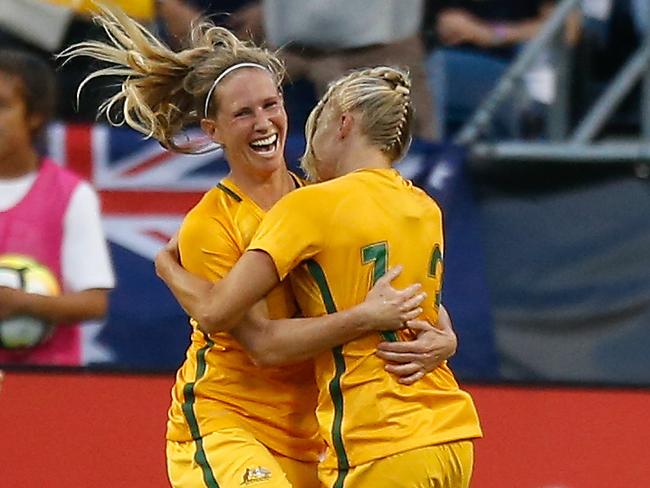 Tameka Yallop (right) and Elise Kellond-Knight (left) went from being academy teammates to Matildas teammates. Picture: Otto Greule Jr/Getty Images