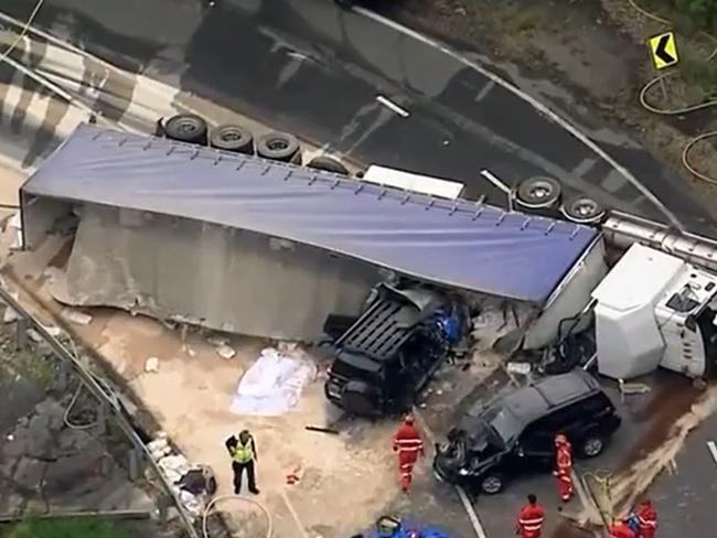 A major emergency operation is underway northwest of Sydney following a horrific car crash betweena truck and two vehicles, which left one woman trapped. Picture: 7 News