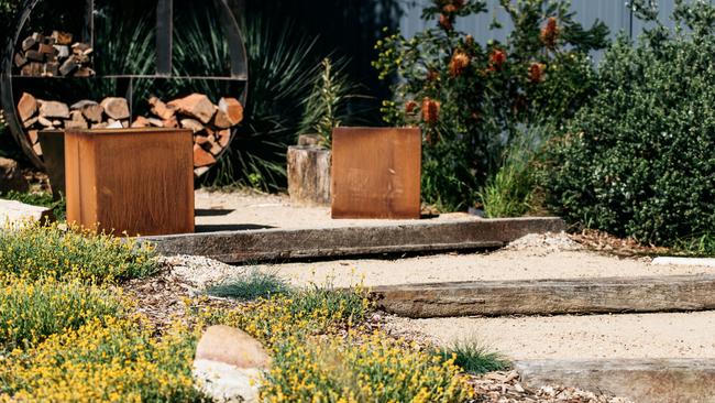 Repurposed materials were used to create the pathways and fencing 