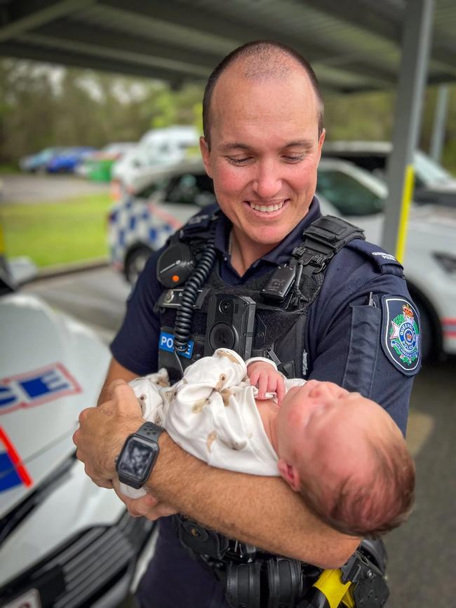 Constable Jacob Pennisi with baby Blake. Picture: Queensland Police Service