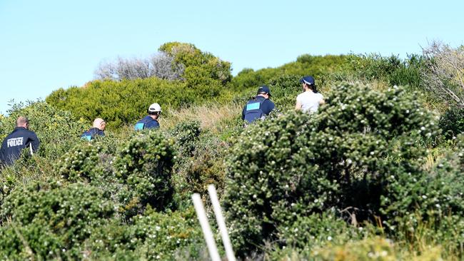 Police search bushland outside the home of the Kings Cross club owner. Picture: AAP