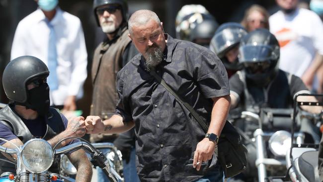 Anthony Dodt father of Peter gives a fist bump to those on bikes at the funeral for his son at Mersey Gardens Chapel in Devonport. Peter died in the Hillcrest Primary School tragedy in Devonport. Picture: Nikki Davis-Jones