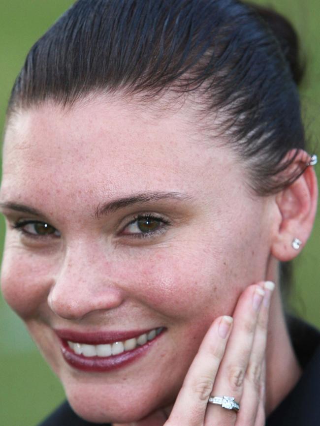 Chloe Maxwell showed off the engagement ring she received from Mat Rogers at the game Pic: Glenn Hampson.