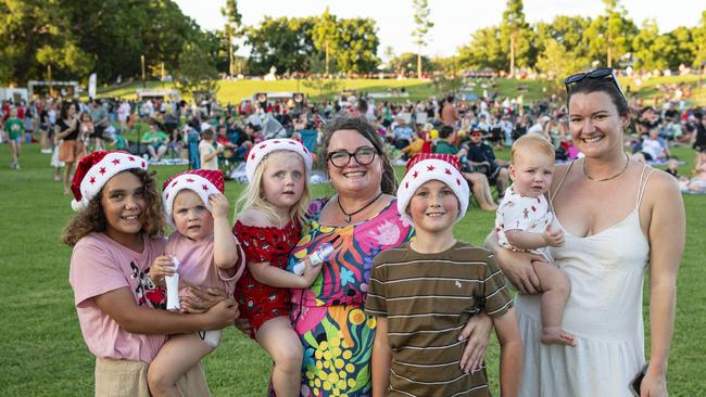 At Triple M Mayoral Carols by Candlelight are Alizah holding Georgia, Cynthia holding Charlotte, Blair and Lauren holding August Hannemann, Sunday, December 8, 2024. Picture: Kevin Farmer