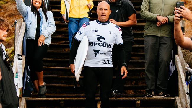 Eleven-time WSL Champion Kelly Slater heads out to surf at Bells Beach(Photo by Aaron Hughes/World Surf League)