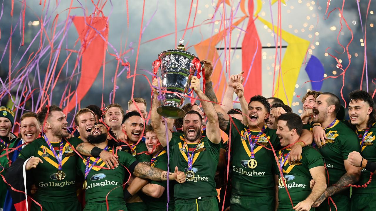 James Tedesco of Australia lifts the Rugby League World Cup trophy. (Photo by Gareth Copley/Getty Images)