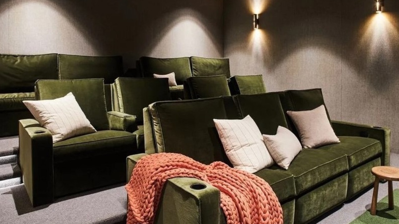 A home theatre with velvet seating is one of the home’s many luxurious amenities. Picture: Realtor