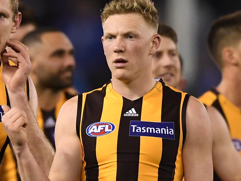 Ben McEvoy (left) and James Sicily of the Hawks react after the Round 20 AFL match between the North Melbourne Kangaroos and the Hawthorn Hawks at Marvel Stadium in Melbourne, Friday, August 2, 2019.  (AAP Image/Julian Smith) NO ARCHIVING, EDITORIAL USE ONLY