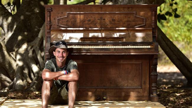 Hayden Clarke plans on replacing the piano (pictured) with another one after it was destroyed by rain. PICTURE: MATT TAYLOR.