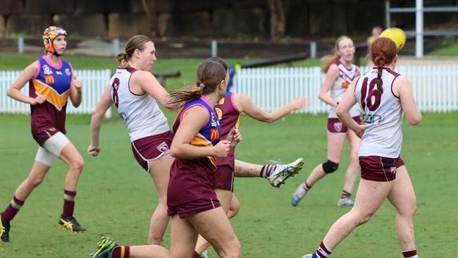 Edie McCabe delivers down the field for teammates.