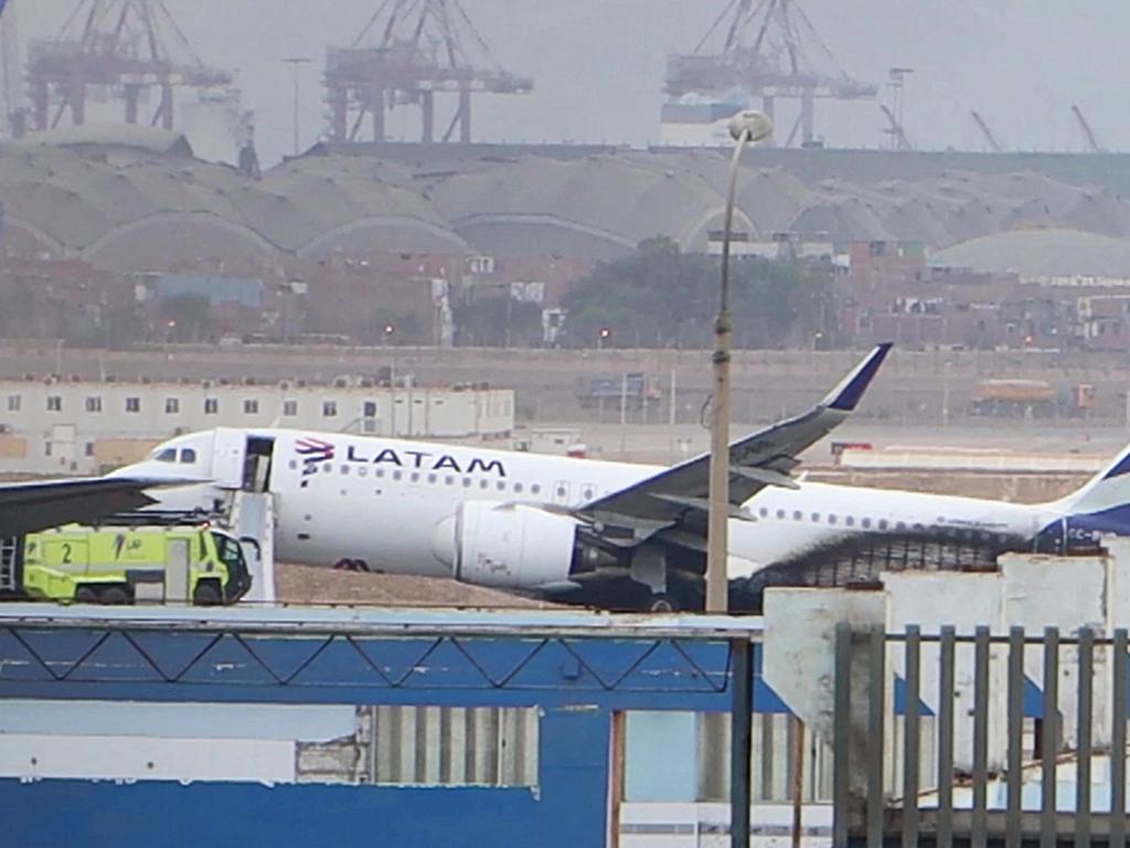 The LA2213 flight plane after it collided with a firefighting vehicle at the Jorge Chavez International Ariport in Lima. Picture: AFP