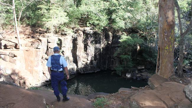 Police at the scene after a swimmer died at the falls in a previous tragedy. Archive image. Picture: Rodney Stevens/Northern Star