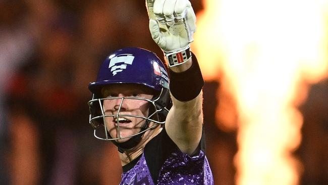 HOBART, AUSTRALIA - JANUARY 27: Mitch Owen of the Hurricanes celebrates scoring a century during the BBL The Final match between Hobart Hurricanes and Sydney Thunder at Ninja Stadium on January 27, 2025 in Hobart, Australia. (Photo by Steve Bell/Getty Images)