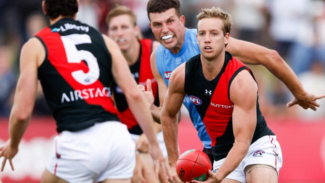 Brad Scott says Darcy Parish (right) is expected to be passed fit to play on Saturday but could be held back for another week depending on how he trains on Wednesday. Picture: Dylan Burns / Getty Images