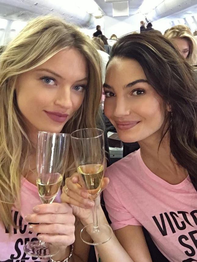 Martha Hunt and Lily Aldridge depart for Paris for the 2016 Victoria's Secret Fashion Show on November 27, 2016 in New York City ... 