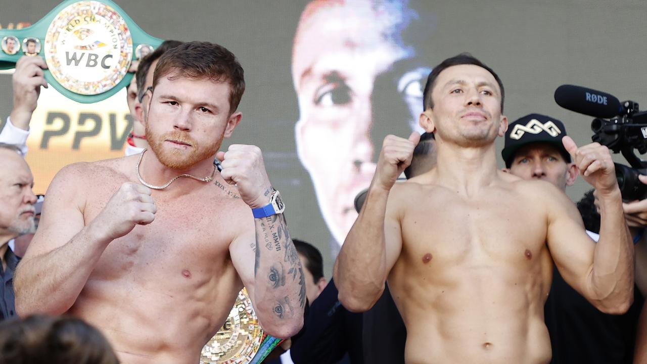 LAS VEGAS, NEVADA - SEPTEMBER 16: Canelo Alvarez of Mexico (L) and Gennadiy Golovkin of Kazakhstan (R) pose during their ceremonial weigh-in at Toshiba Plaza on September 16, 2022 in Las Vegas, Nevada. Alvarez and Golovkin will meet for the undisputed super middleweight title bout at T-Mobile Arena in Las Vegas on September 17. Sarah Stier/Getty Images/AFP