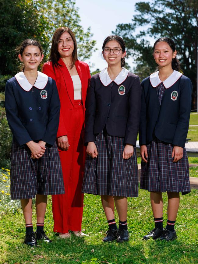 Tangara School for Girls Principal Rita Sakr with her Year 9 students Grace, Francesca and Merryn. Picture: Justin Lloyd.