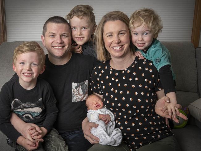 Evan Hancock and Laini Keating with their children Tom, Finn, Fox and George. Picture: Chris Kidd