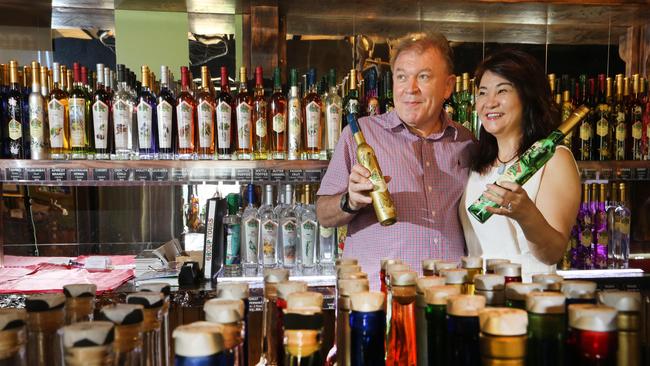 Gordon Chalmers and Shumei Hou have just bought the beloved Tamborine Mountain Distillery. The two look over the tasting room after the sale. Picture: Glenn Hampson