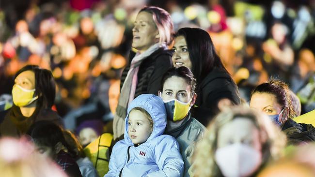 Members of the public watch on ahead of the announcement that Brisbane would host the Olympics in 2032. (Photo by Albert Perez/Getty Images)