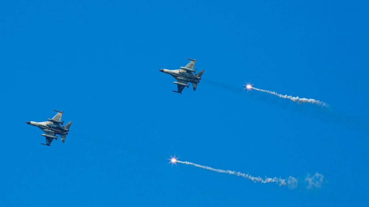 Taiwan's fighter jets release flares during the Han Kuang military exercise, which simulates a China's People's Liberation Army invasion of the island. Picture: Getty Images