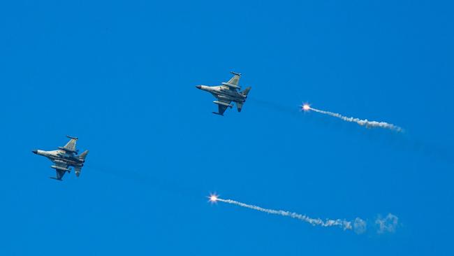 Taiwan's fighter jets release flares during the Han Kuang military exercise, which simulates a China's People's Liberation Army invasion of the island. Picture: Getty Images