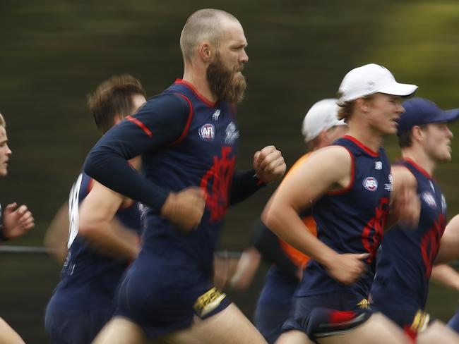 MELBOURNE, AUSTRALIA - DECEMBER 09: Max Gawn of the Demons (C) runs with teammates during a Melbourne Demons AFL training session at Casey Fields on December 09, 2020 in Melbourne, Australia. (Photo by Daniel Pockett/Getty Images)