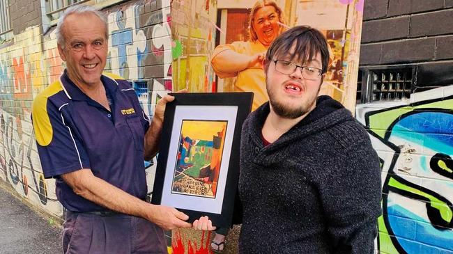 SMART ART: REDinc artist Lucas Wright and Geoff Golding of GT Automotive (Lismore), outside of REDinc Art Studio in Lismore. Lucas gifted Geoff with a framed print of one of his original art works.GT Automotive donated money to Lucas for his travel and art material costs for his artist residency at Bundanon Trust, in the Shoalhaven region of NSW.