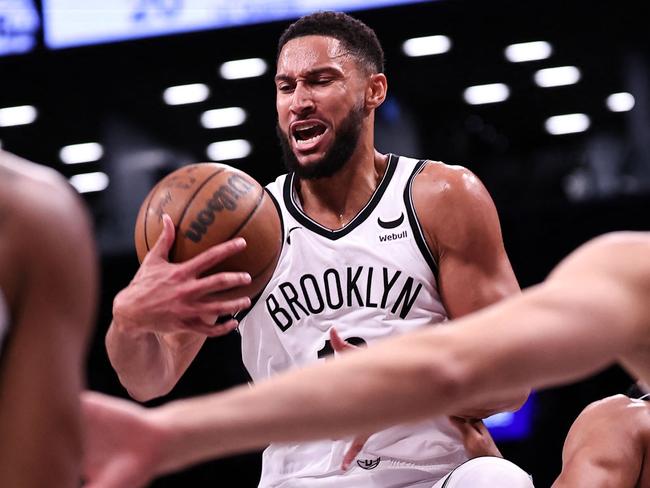 NEW YORK, NEW YORK - OCTOBER 16: Ben Simmons #10 of the Brooklyn Nets gathers a rebound during the first quarter of the preseason game against the Philadelphia 76ers at Barclays Center on October 16, 2023 in New York City. NOTE TO USER: User expressly acknowledges and agrees that, by downloading and or using this photograph, User is consenting to the terms and conditions of the Getty Images License Agreement.   Dustin Satloff/Getty Images/AFP (Photo by Dustin Satloff / GETTY IMAGES NORTH AMERICA / Getty Images via AFP)