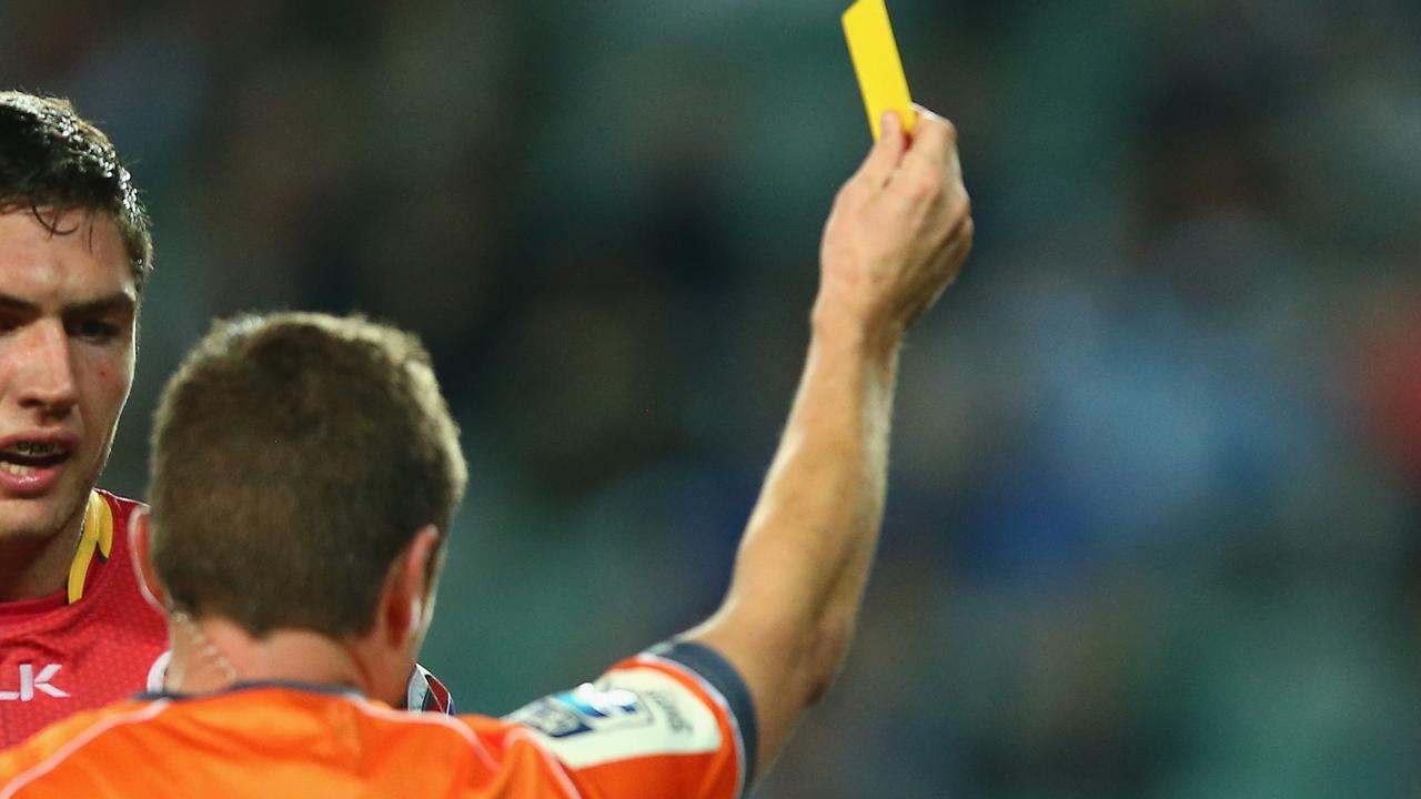 SYDNEY, AUSTRALIA - JUNE 13: Rob Simmons (L) and Adam Thomson (R) looks dejected as referee Nick Briant shows Thomson a yellow card during the round 18 Super Rugby match between the Waratahs and the Reds at Allianz Stadium on June 13, 2015 in Sydney, Australia. (Photo by Mark Kolbe/Getty Images)