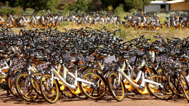 Hundreds of oBikes in storage at a disused Nunawading brick factory. Picture: Stuart McEvoy/Australian