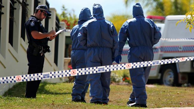 Queensland Police and Forensic Officers pictured here outside a home in The Gap after a body was discovered early this morning. Picture: Jack Tran