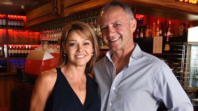 Costa D'Oro restaurant owners Michael and Nuccia Fusco say the tram, more parking and new venues lifting overall standards are leading to locals rediscovering the Surfers Paradise precinct. Photo: Steve Holland.