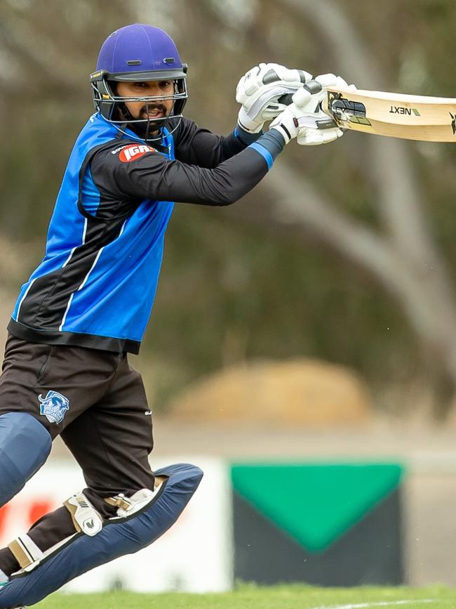 Greenvale batsman Sunam Gautam carves a ball through the off side. 