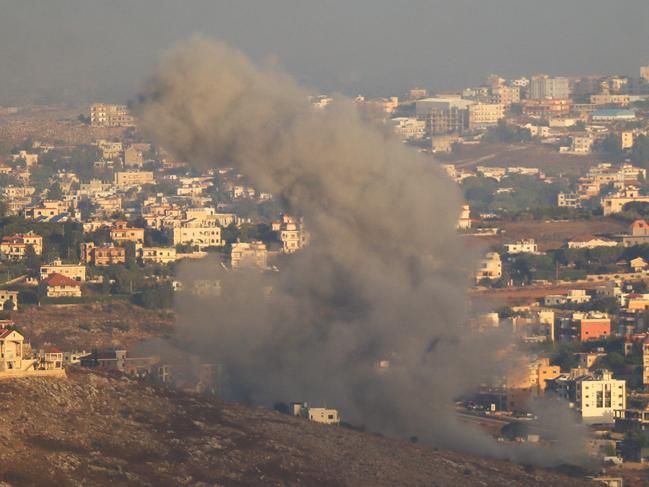 Smoke billows from the site of an Israeli air strike on the outskirts of the southern village of Habbouch on September 23, 2024. Picture: AFP