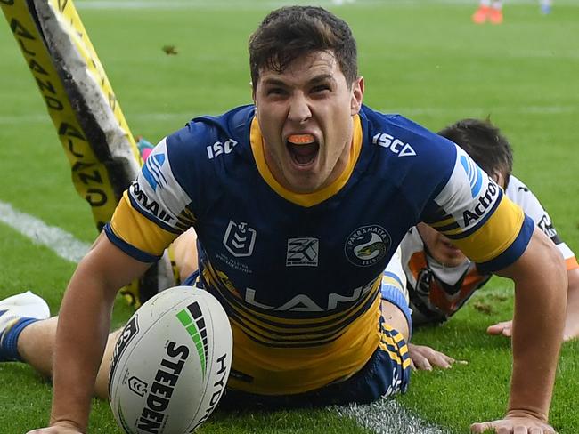 Mitchell Moses of the Eels celebrates his opening try during the Round 6 NRL match between the Parramatta Eels and the Wests Tigers at Bankwest Stadium in Sydney, Monday, April 22, 2019.(AAP Image/Dean Lewins) NO ARCHIVING, EDITORIAL USE ONLY