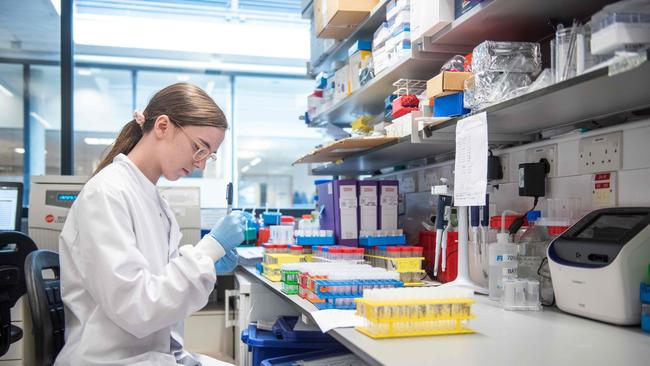 A University of Oxford technician working on the university's COVID-19 candidate vaccine. Picture: John Cairns, AFP