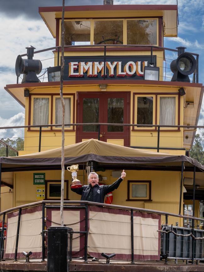 Melbourne Cup-winning jockey John Letts takes the Cup on the Murry River in Echuca on the Victoria-NSW border.